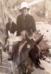 Sue Paul and husband on donkeys in Greece